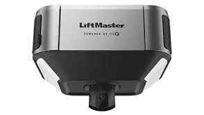 Technician installing a new garage door opener in a Cedar Park home garage